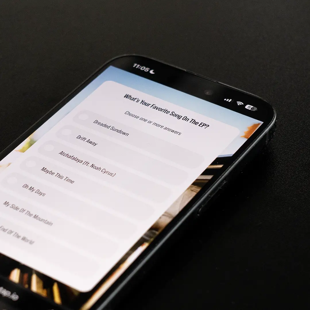 phone close up with a poll on screen