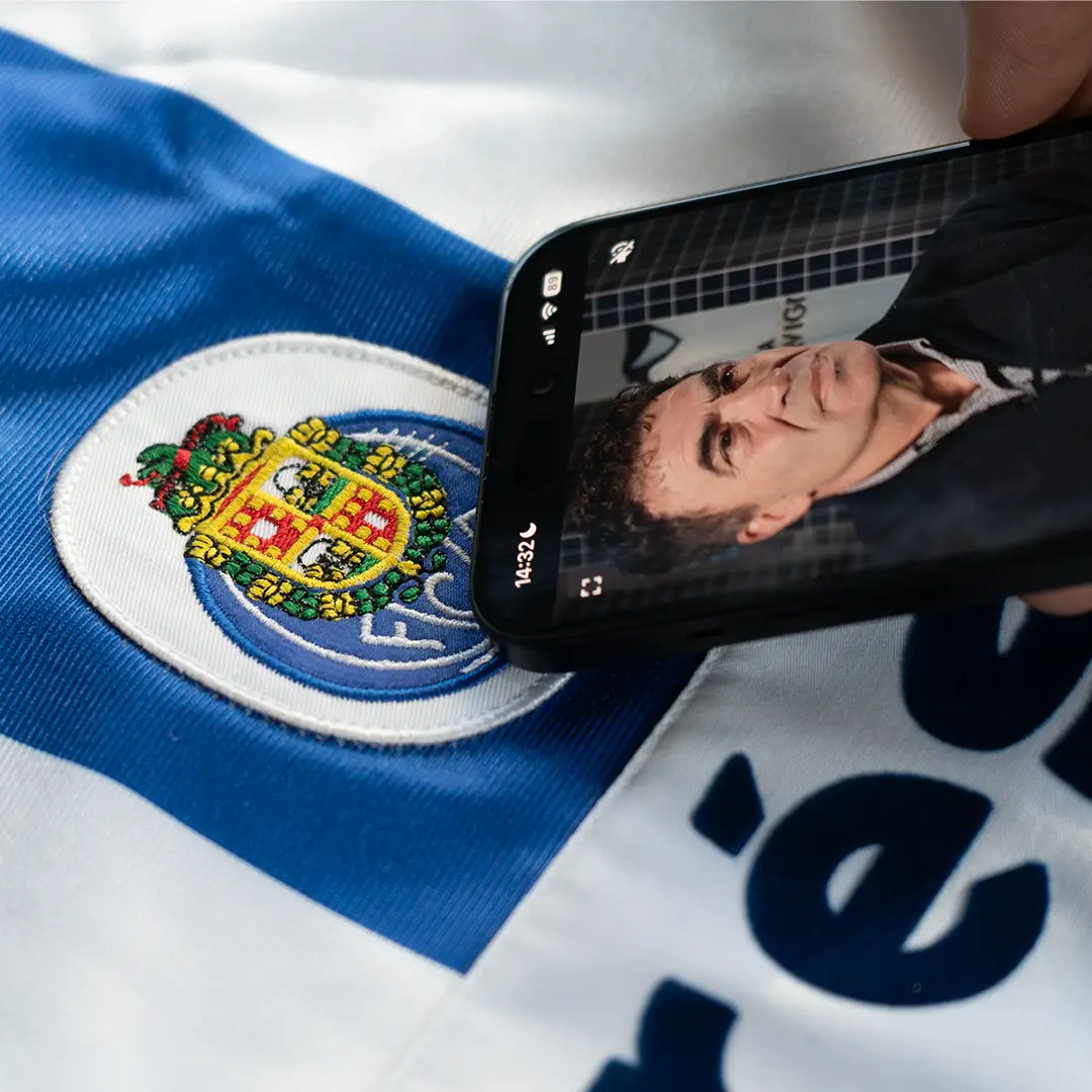 Smartphone interacting with NFC-enabled jersey