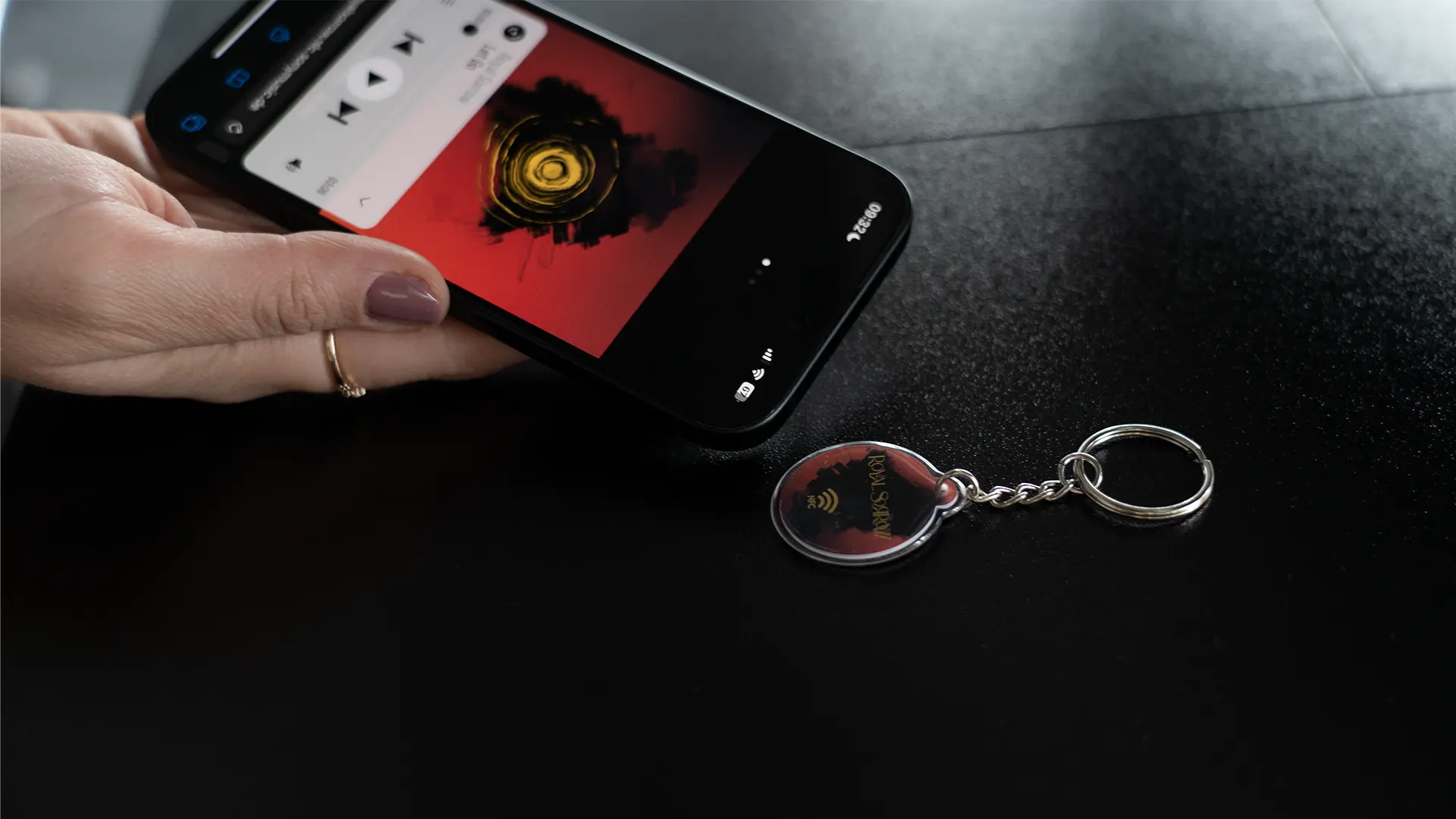 smartphone scanning nfc enabled keychain